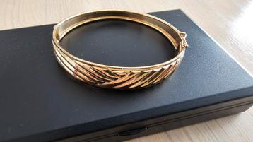 Nieuwstaat 14k gouden slavenarmband 11,3 GR €650 beschikbaar voor biedingen