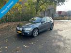 BMW 1-serie 118i Business NETTE AUTO RIJDT EN SCHAKELT GOED, Auto's, BMW, 1-Serie, Achterwielaandrijving, Gebruikt, Zwart