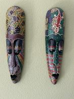 2 maskers, Ophalen