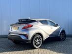 Toyota C-HR 1.8 Hybrid Executive Half Leder Stoelverwarming, Auto's, Toyota, 12 maanden, Euro 6, 4 cilinders, Leder en Stof