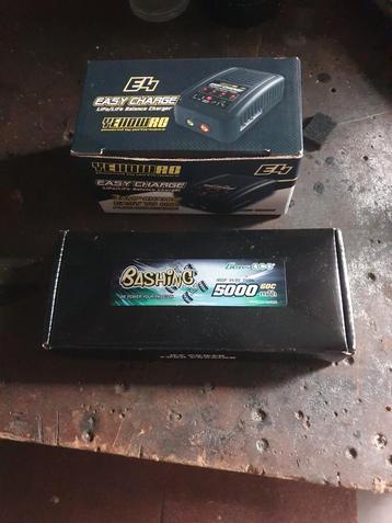 Rc oplader plus accu  zie foto's  beschikbaar voor biedingen