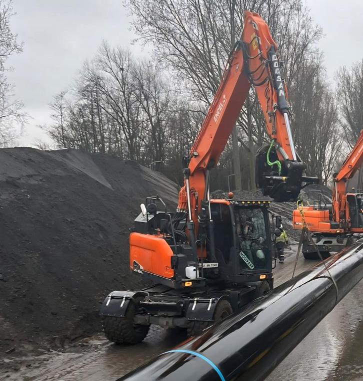 Doosan DX165W 2017 met draaikantelstuk & gripper, Zakelijke goederen, Machines en Bouw | Kranen en Graafmachines, Kraan, Ophalen