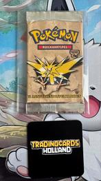 Pokemon 1st Edition Fossil GUARANTEED HEAVY Booster Pack NL, Ophalen of Verzenden, Zo goed als nieuw, Booster