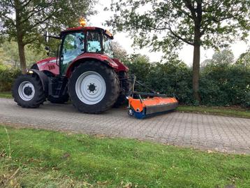  trekker met chauffeur en minigraver met machinist 