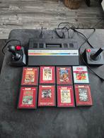 Atari 2600 spelcomputer + games, Spelcomputers en Games, Spelcomputers | Atari, Ophalen of Verzenden, Gebruikt, Met 2 controllers