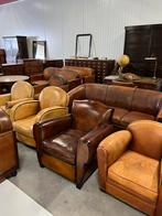 Collectie schapenleren fauteuils en banken