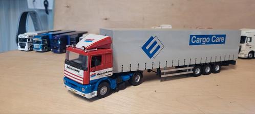 Tekno DAF 95 Heisterkamp met Cargo Care trailer, Hobby en Vrije tijd, Modelauto's | 1:50, Zo goed als nieuw, Bus of Vrachtwagen