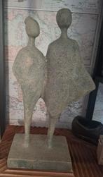 Antiekgrijs beeld Teslin van Loberon,
2 mensen op een voet, Ophalen of Verzenden, Zo goed als nieuw