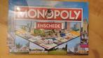bordspel in seal Monopoly Enschede Monopolie 2e editie, Hobby en Vrije tijd, Een of twee spelers, Ophalen of Verzenden, Nieuw
