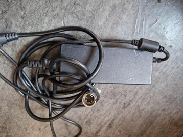 Fiets accu oplader 28v/2A. beschikbaar voor biedingen