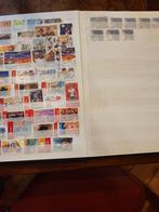 Buitenlandse postzegels in verzamelboek zwart, Ophalen of Verzenden, Buitenland