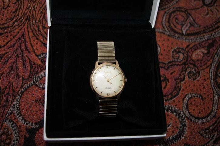 RADO ( Polshorloge oowinder, Antiek en Kunst, Antiek | Klokken, Ophalen of Verzenden