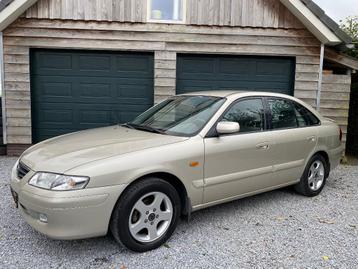 Mazda 626 1.8 HB Comfort. Nw. distr.riem. 4x nw.4 seiz.band. beschikbaar voor biedingen