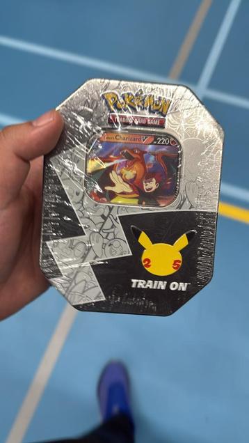Pokemon Celebrations Tin - Lance's Charizard beschikbaar voor biedingen