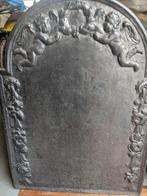 Antieke metalen openhaard plaat, Ophalen