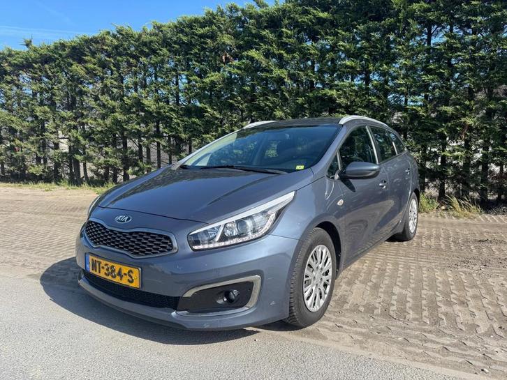 Kia Cee'd Sportswagon 1.6 CRDi Business Navigator, Auto's, Kia, Bedrijf, Te koop, (Pro) Cee d, ABS, Achteruitrijcamera, Airbags