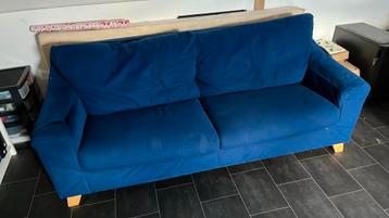 Gestoffeerde blauwe bank