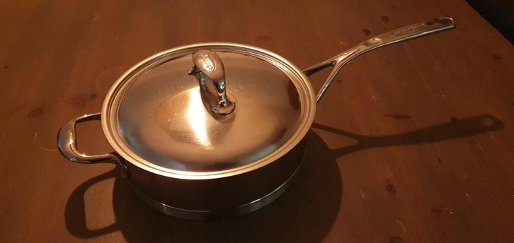 Demeyere Atlantis sauteerpan met deksel ø 24 cm rvs, Huis en Inrichting, Keuken | Potten en Pannen, Zo goed als nieuw, Koekenpan of Braadpan