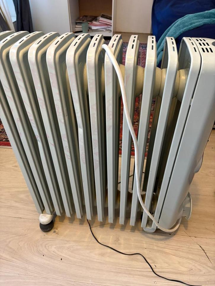 De'Longhi TRRS1225 Oliegevulde Radiator, Huis en Inrichting, Kachels, Gebruikt, Vrijstaand, Oliekachel, Elektrisch, Ophalen