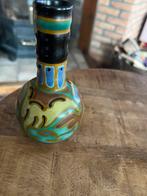 Keramiek vaasje, Ophalen