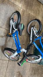 Woom fiets blauw 2, Fietsen en Brommers, Ophalen, Zo goed als nieuw, Minder dan 16 inch