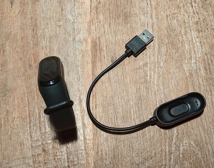 Kapotte Xiaomi Mi Band 4, Sieraden, Tassen en Uiterlijk, Smartwatches, Gebruikt, Android, Zwart, Ophalen of Verzenden