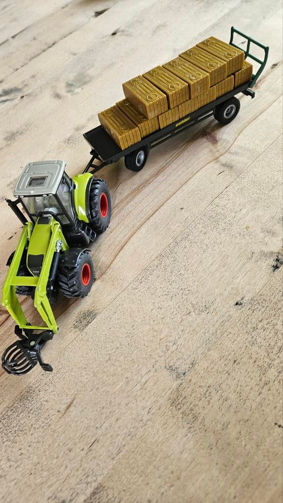 SIKU Claus trekker met aanhanger,schaal 1:50., Ophalen of Verzenden, Hijskraan, Tractor of Landbouw, SIKU