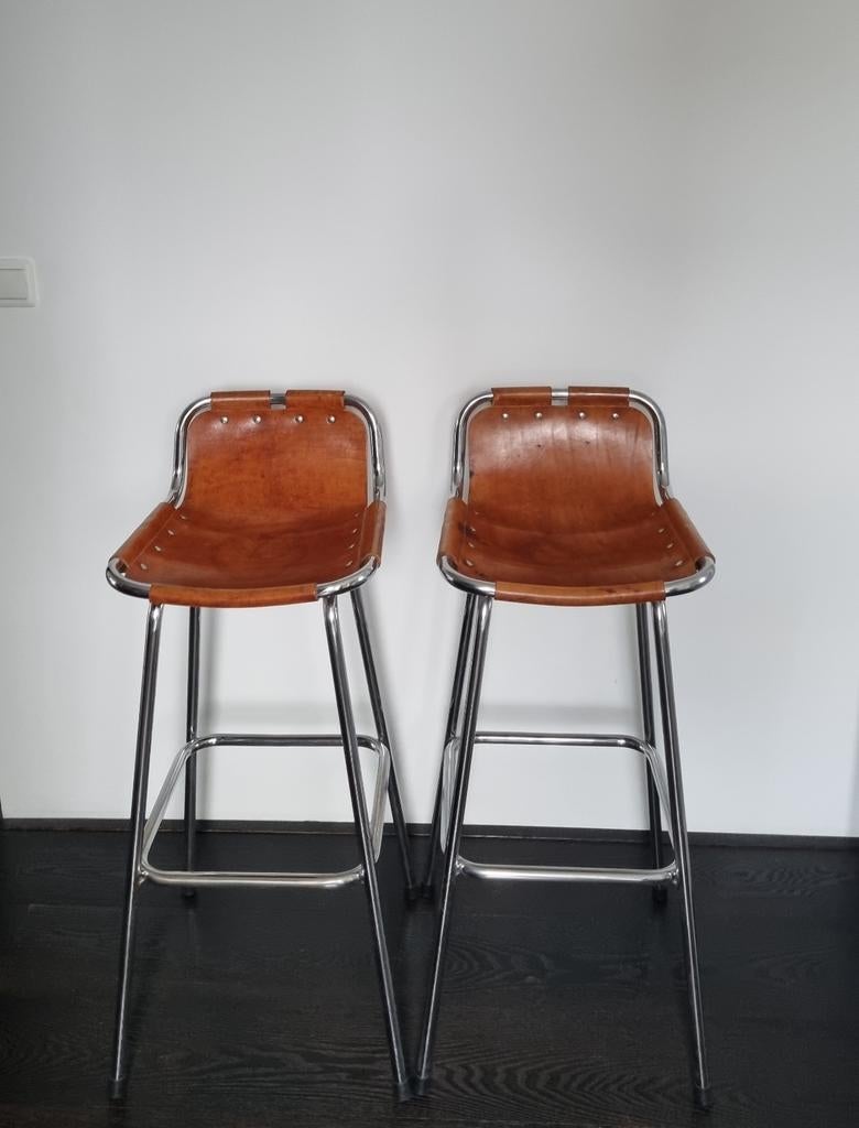 Vintage leren barkrukken Charlotte Perriand - set van 2, Huis en Inrichting, Ophalen, Gebruikt, Met voetsteun, 60 tot 90 cm