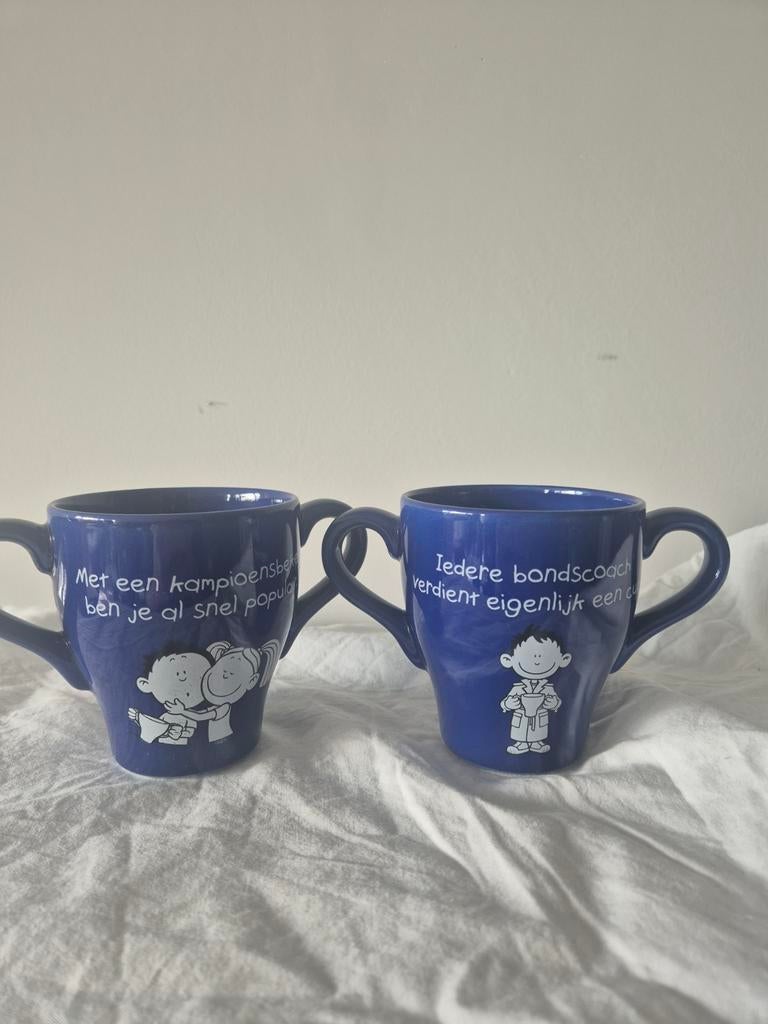 Twee Blueband mokken uit 2000, Gebruikt, Keramiek, Ophalen of Verzenden, Overige stijlen