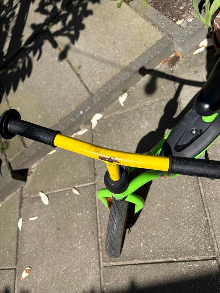 Puky loopfiets groen/oranje met standaard, Kinderen en Baby's, Speelgoed | Buiten | Voertuigen en Loopfietsen, Ophalen of Verzenden