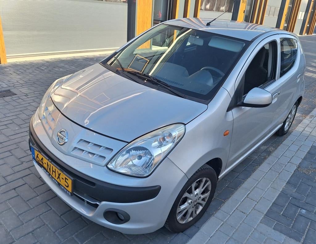 Nissan Pixo 1.0 50KW 5D 2010 Grijs, Auto's, Nissan, Voorwielaandrijving, 200 kg, Origineel Nederlands, Handgeschakeld