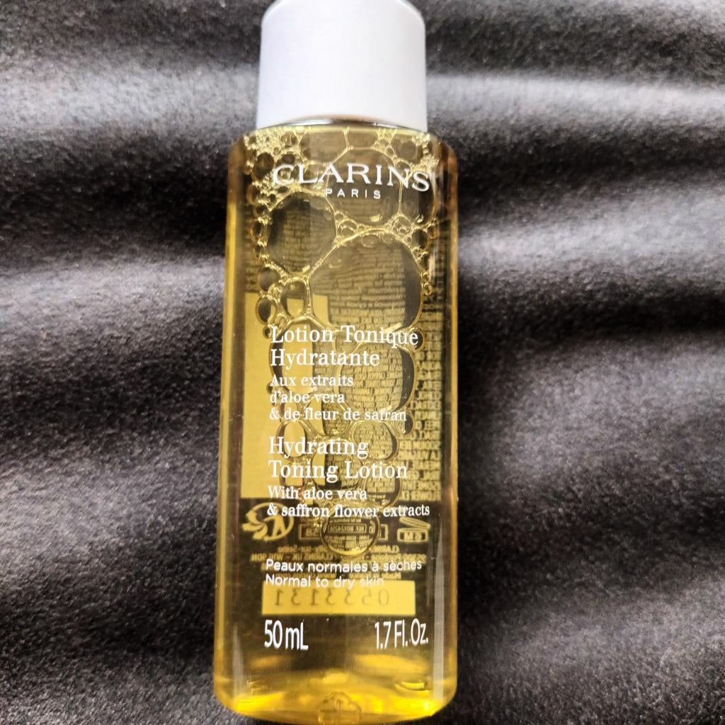 CLARINS hydrating tonic lotion..50 ml..nieuw, Ophalen of Verzenden, Nieuw, Gehele gezicht