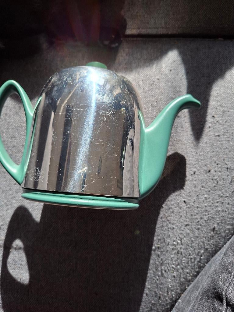 Theepot met een warmhouder, Huis en Inrichting, Keuken | Servies, Gebruikt, Keramiek, Overige typen, Ophalen of Verzenden