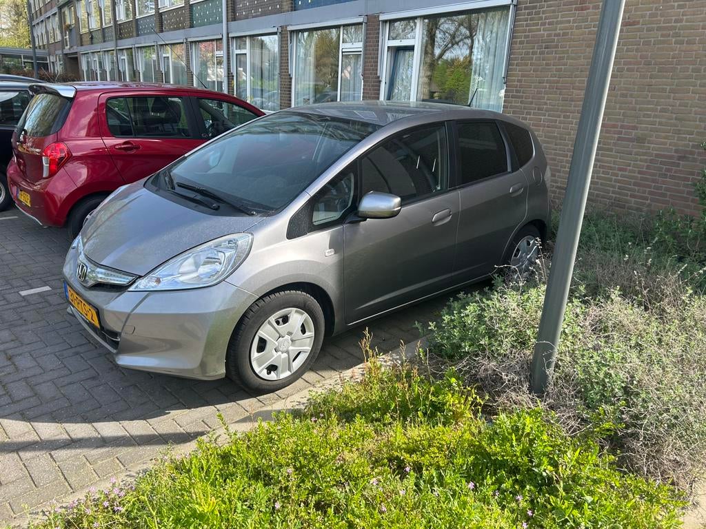 Honda Jazz 1.4 I-vtec 102pk CVT 2011 Grijs, Auto's, Honda, Particulier, Jazz, Hybride Elektrisch/Benzine, Volledig hybride, A