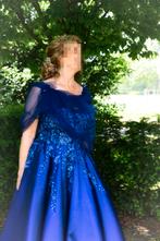 Trouwjurk galajurk koningsblauw van bruidszaak Ann en John, Ophalen of Verzenden, Zo goed als nieuw, Blauw, Trouwjurk
