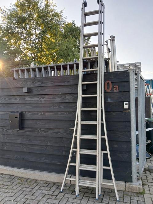 3 delige ladder 3x14 merk Solide lengte 9.25 meter max, Doe-het-zelf en Verbouw, Ladders en Trappen, Gebruikt, 4 meter of meer