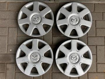 Mazda wieldoppen 15 inch 4 stuks in goede staat. beschikbaar voor biedingen