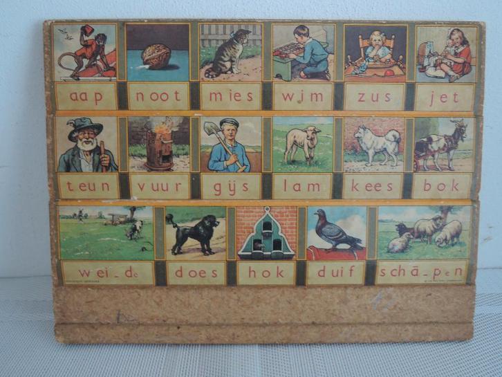 Oud Wolters leesplankje, Antiek en Kunst, Antiek | Speelgoed, Ophalen of Verzenden