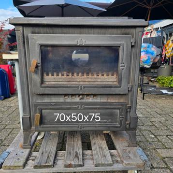 Gietijzeren houtkachel  beschikbaar voor biedingen