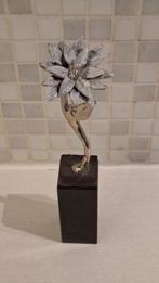 sculptuur bloem, Ophalen
