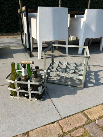 Gietijzeren flessenrek en krat beschikbaar voor biedingen