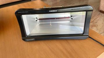 Elektrische infrarood halogeen terrasverwarming. (Aan muur) beschikbaar voor biedingen