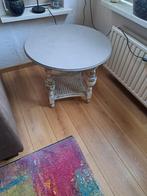 Ronde eiken salontafel, Ophalen