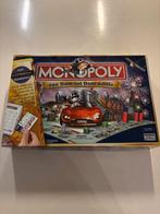 Monopoly van Dam tot Dom editie - met elektonisch bankieren!, Hobby en Vrije tijd, Een of twee spelers, Ophalen of Verzenden, Zo goed als nieuw