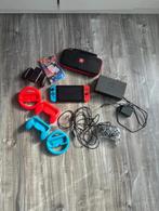 Nintendo switch + licht gevende console + stuurtjes + meer, Spelcomputers en Games, Spelcomputers | Nintendo Switch, Verzenden