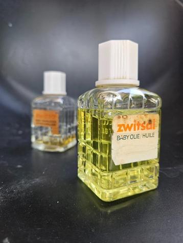 Zwitsal vintage olie flesjes beschikbaar voor biedingen