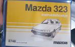 Instructieboekje Mazda 323 (BF) met mapje, Ophalen of Verzenden