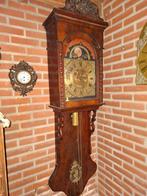 Antieke Friese staartklok met datum, Ophalen