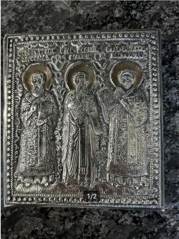 Kleine antieke verzilverde Russische icoon beschikbaar voor biedingen