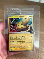 GAMESTOP Exclusive Sealed Rocket’s Zapdos promo, Hobby en Vrije tijd, Verzamelkaartspellen | Pokémon, Ophalen of Verzenden, Zo goed als nieuw